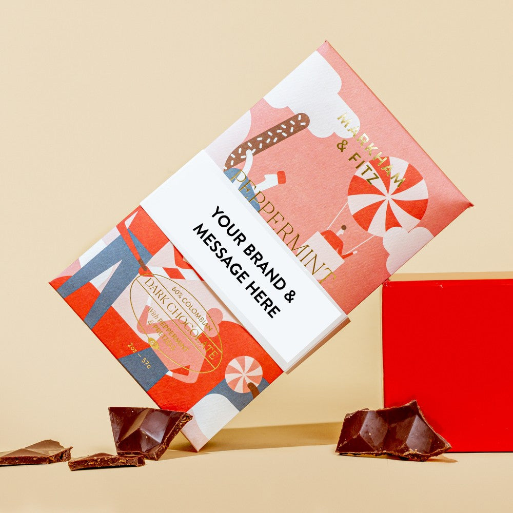 Markham & Fitz bars wrapped in a white paper band printed with a sample brand name